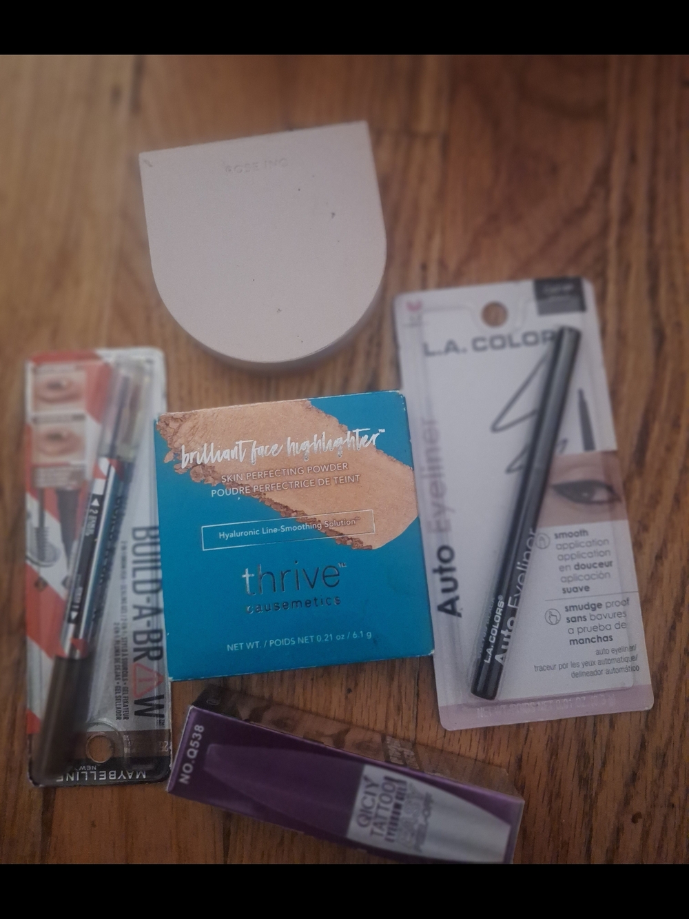 thrive causemetics Highlighter Powder in Teal & Rose Gold Packaging And Other Co